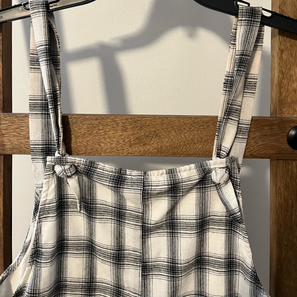 checkered jumpsuit size xs/2-4. Worn but no snags or tears